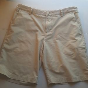 ADIDAS Mens Shorts, size 34, Cream color.